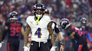 Dec 25, 2024; Houston, Texas, USA; Baltimore Ravens wide receiver Zay Flowers (4) reacts after his first down catch against the Houston Texans  in the first quarter at NRG Stadium. 