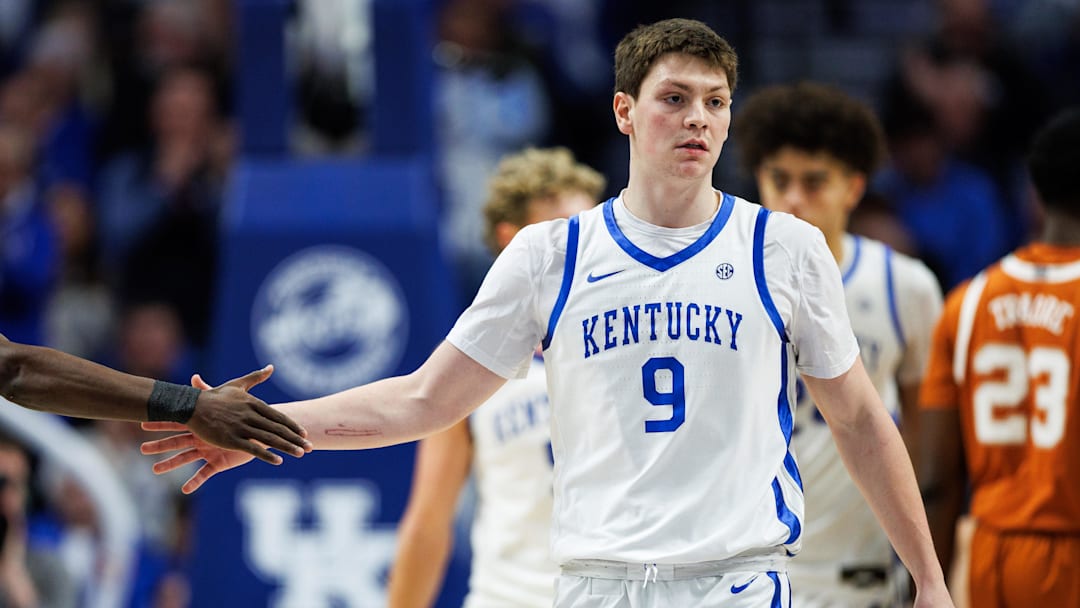 Jan 21, 2026; Lexington, Kentucky, USA; Kentucky Wildcats forward Trent Noah (9) fives guard Denzel Aberdeen during the second half against the Texas Longhorns at Rupp Arena at Central Bank Center. Mandatory Credit: Jordan Prather-Imagn Images