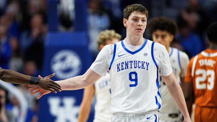 Jan 21, 2026; Lexington, Kentucky, USA; Kentucky Wildcats forward Trent Noah (9) fives guard Denzel Aberdeen during the second half against the Texas Longhorns at Rupp Arena at Central Bank Center. Mandatory Credit: Jordan Prather-Imagn Images