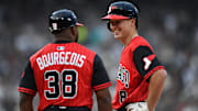 Jun 6, 2025; Chicago, Illinois, USA; Chicago White Sox catcher Kyle Teel (8) celebrates his single for his first MLB hit in his debut with first base coach Jason Bourgeois (38) during the fourth inning against the Kansas City Royals at Rate Field. Mandatory Credit: Patrick Gorski-Imagn Images
