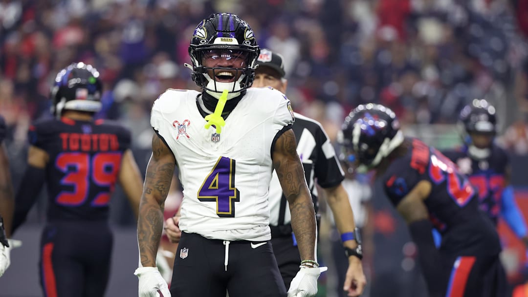 Dec 25, 2024; Houston, Texas, USA; Baltimore Ravens wide receiver Zay Flowers (4) reacts after his first down catch against the Houston Texans  in the first quarter at NRG Stadium.