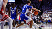 Arizona guard Caleb Love (1) was held to eight points in the Wildcats' loss to Duke back in November.