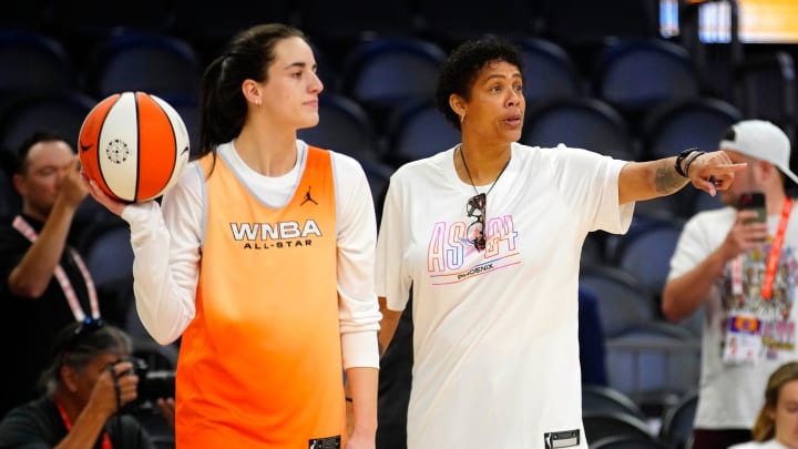 WNBA All-Star coach Cheryl Miller talks to Fever guard Caitlin Clark 