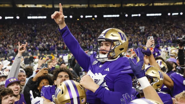 Husky place-kicker Grady Gross celebrates his game-winning field goal against the Washington State Cougars in the Apple Cup.