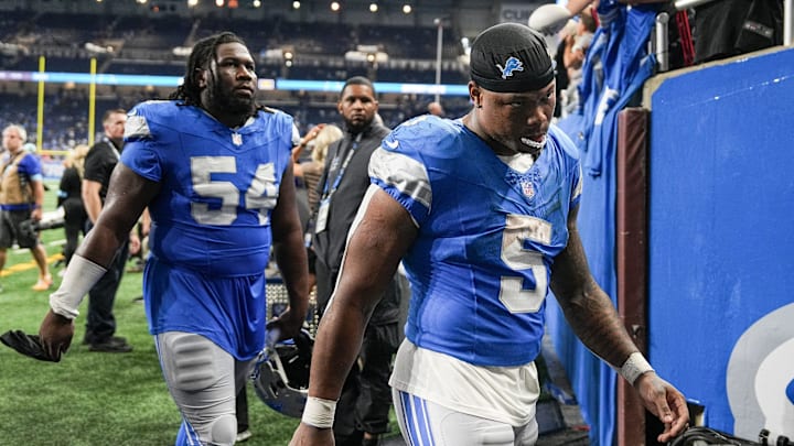 Detroit Lions running back David Montgomery (5) and defensive tackle Alim McNeill (54).