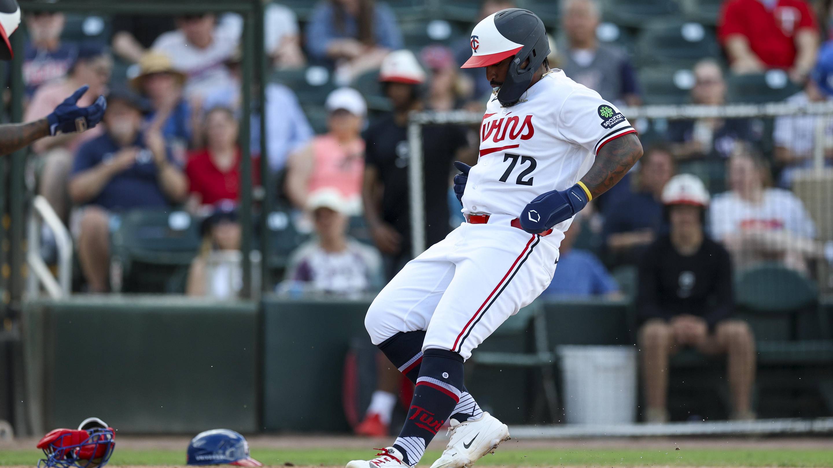 Mar 4, 2026; Fort Myers, Florida, USA; Minnesota Twins right fielder Gabriel Gonzalez (72) scores a run on a wild pitch against against the Puerto Rico in the seventh inning during spring training at Lee Health Sports Complex/Hammond Stadium.