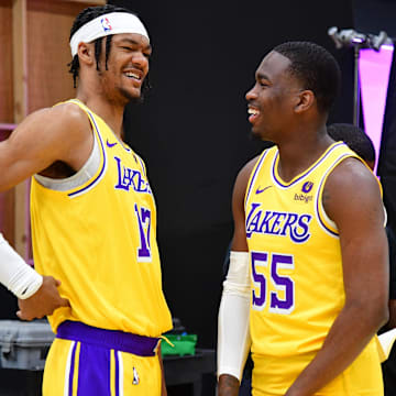 Oct 2, 2023; El Segundo, CA, USA; Los Angeles Lakers forward Alex Fudge (17) speaks with guard D'Moi Hodge (55) during media day at UCLA Health Training Center. Mandatory Credit: Gary A. Vasquez-Imagn Images