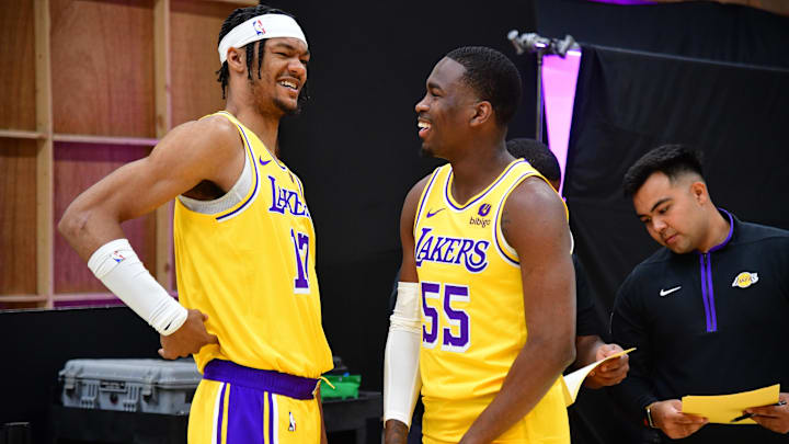 Oct 2, 2023; El Segundo, CA, USA; Los Angeles Lakers forward Alex Fudge (17) speaks with guard D'Moi Hodge (55) during media day at UCLA Health Training Center. Mandatory Credit: Gary A. Vasquez-Imagn Images