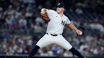 Sep 9, 2024; Bronx, New York, USA; New York Yankees starting pitcher Carlos Rodon (55) pitches against the Kansas City Royals during the third inning at Yankee Stadium. Mandatory Credit: Brad Penner-Imagn Images