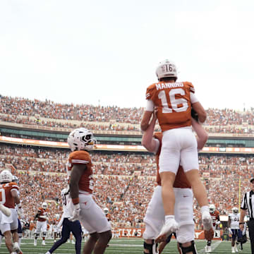 Sep 14, 2024; Austin, Texas, USA; Texas Longhorns quarterback Arch Manning (16) reacts after scoring a touchdown during the first half against the Texas-San Antonio Roadrunners at Darrell K Royal-Texas Memorial Stadium. Mandatory Credit: Scott Wachter-Imagn Images