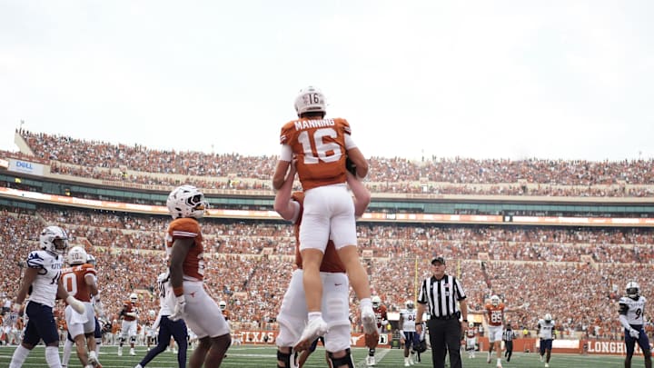 Sep 14, 2024; Austin, Texas, USA; Texas Longhorns quarterback Arch Manning (16) reacts after scoring a touchdown during the first half against the Texas-San Antonio Roadrunners at Darrell K Royal-Texas Memorial Stadium. Mandatory Credit: Scott Wachter-Imagn Images