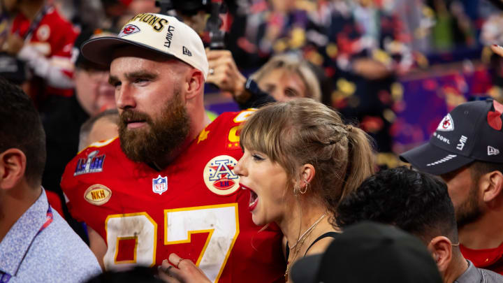 Feb 11, 2024; Paradise, Nevada, USA; Kansas City Chiefs tight end Travis Kelce (87) celebrates with girlfriend Taylor Swift after defeating the San Francisco 49ers in Super Bowl LVIII at Allegiant Stadium.