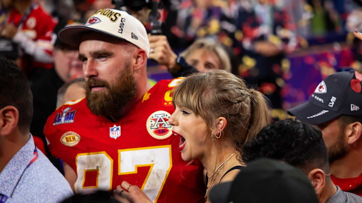 Feb 11, 2024; Paradise, Nevada, USA; Kansas City Chiefs tight end Travis Kelce (87) celebrates with girlfriend Taylor Swift after defeating the San Francisco 49ers in Super Bowl LVIII at Allegiant Stadium. Mandatory Credit: Mark J. Rebilas-Imagn Images