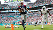 New England Patriots quarterback Drake Maye (10) runs into the end zone for a touchdown against the Miami Dolphins in the third quarter at Hard Rock Stadium in Week 2 this season.