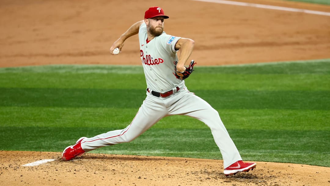 Aug 10, 2025; Arlington, Texas, USA; Philadelphia Phillies starting pitcher Zack Wheeler (45) throws dur ing the third inning against the Texas Rangers at Globe Life Field. Mandatory Credit: Kevin Jairaj-Imagn Images