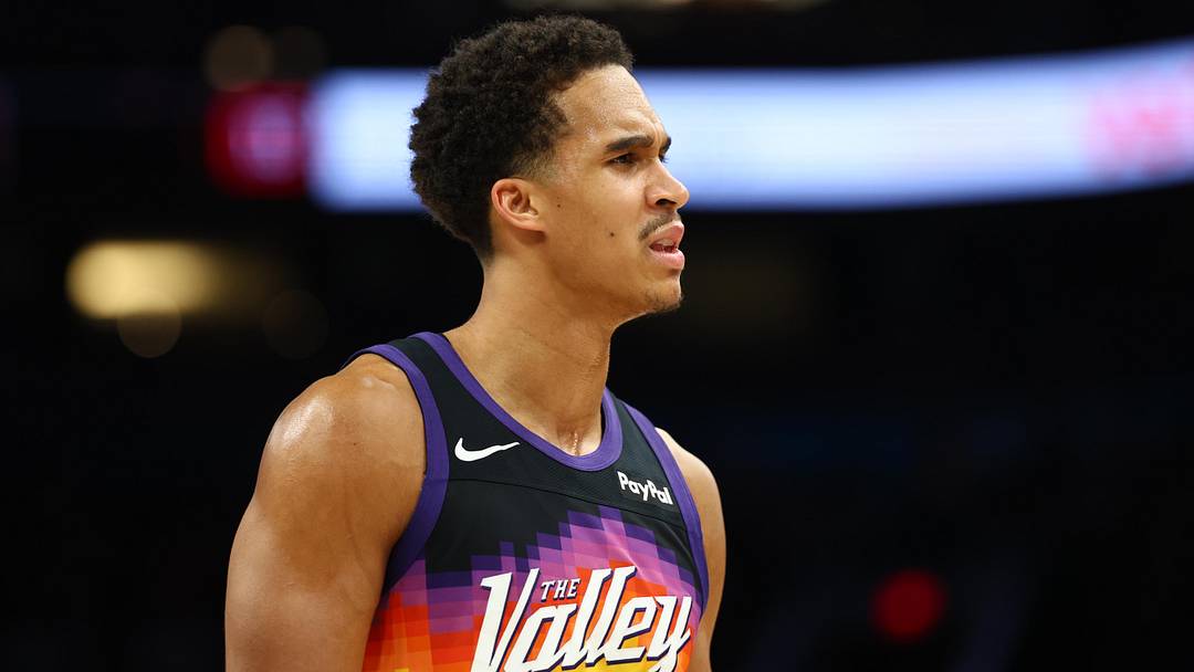 Mar 28, 2026; Phoenix, Arizona, USA; Phoenix Suns forward Oso Ighodaro (11) against the Utah Jazz at Mortgage Matchup Center. Mandatory Credit: Mark J. Rebilas-Imagn Images