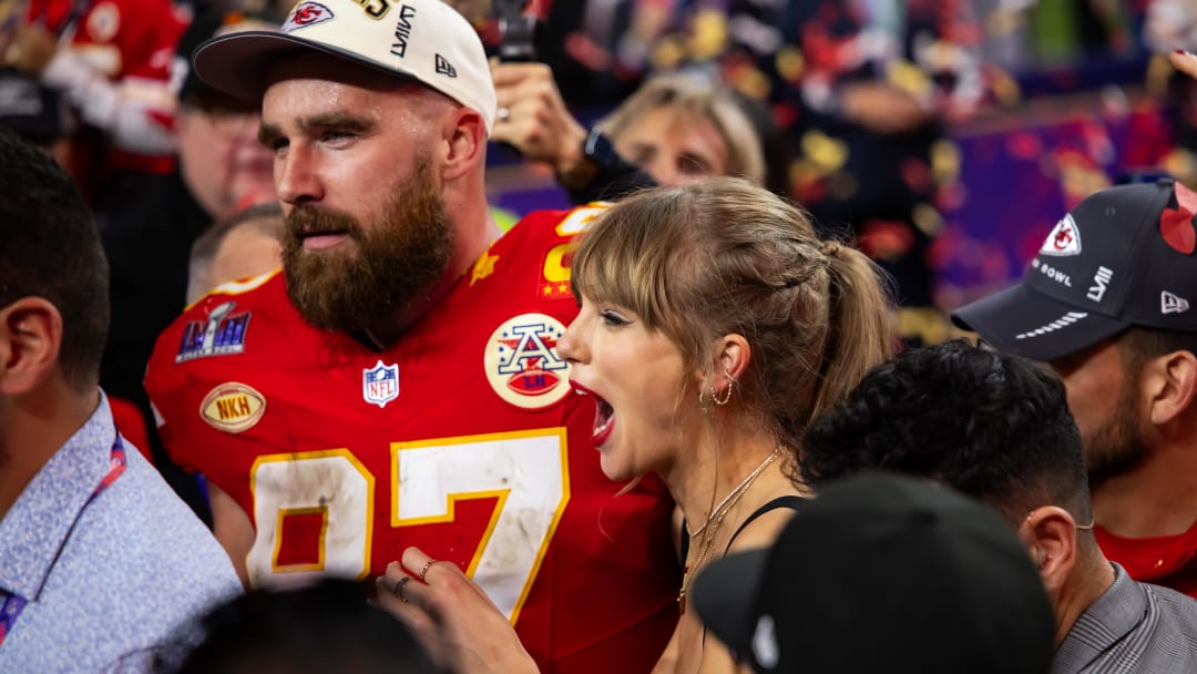 Feb 11, 2024; Paradise, Nevada, USA; Kansas City Chiefs tight end Travis Kelce (87) celebrates with girlfriend Taylor Swift after defeating the San Francisco 49ers in Super Bowl LVIII at Allegiant Stadium.