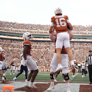 Sep 14, 2024; Austin, Texas, USA; Texas Longhorns quarterback Arch Manning (16) reacts after scoring a touchdown during the first half against the Texas-San Antonio Roadrunners at Darrell K Royal-Texas Memorial Stadium. Mandatory Credit: Scott Wachter-Imagn Images