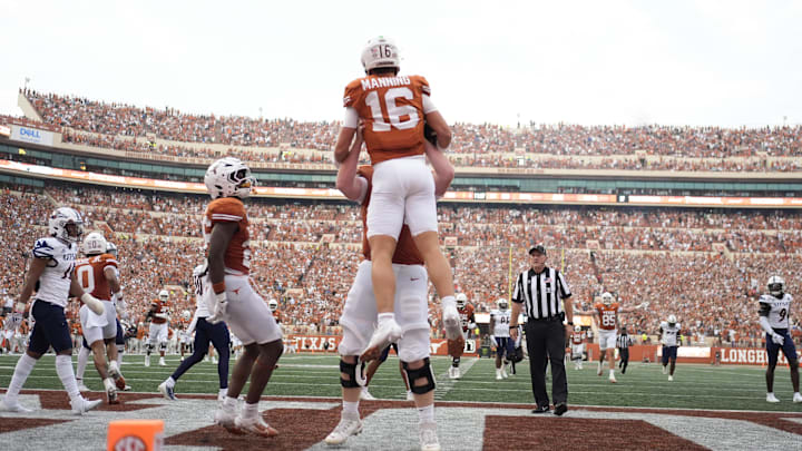 Sep 14, 2024; Austin, Texas, USA; Texas Longhorns quarterback Arch Manning (16) reacts after scoring a touchdown during the first half against the Texas-San Antonio Roadrunners at Darrell K Royal-Texas Memorial Stadium. Mandatory Credit: Scott Wachter-Imagn Images