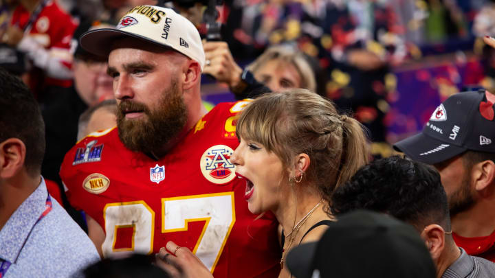 Feb 11, 2024; Paradise, Nevada, USA; Kansas City Chiefs tight end Travis Kelce (87) celebrates with girlfriend Taylor Swift after defeating the San Francisco 49ers in Super Bowl LVIII at Allegiant Stadium. Mandatory Credit: Mark J. Rebilas-USA TODAY Sports