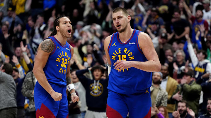 Jan 23, 2025; Denver, Colorado, USA; Denver Nuggets center Nikola Jokic (15) reacts along side forward Aaron Gordon (32) following a full court basket made in the second half against the Sacramento Kings at Ball Arena. Mandatory Credit: Ron Chenoy-Imagn Images Jan 23, 2025; Denver, Colorado, USA; Denver Nuggets center Nikola Jokic (15) reacts along side forward Aaron Gordon (32) following a full court basket made in the second half against the Sacramento Kings at Ball Arena. Mandatory Credit: Ron Chenoy-Imagn Images