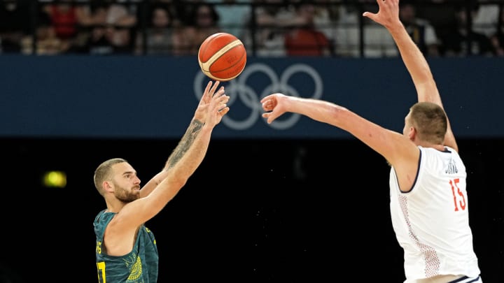 Aug 6, 2024; Paris, France; Australia small forward Jack McVeigh (17) shoots the ball against Serbia power forward Nikola Jokic (15) during the second half in men’s basketball quarterfinals during the Paris 2024 Olympic Summer Games at Accor Arena.