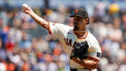 Jul 11, 2024; San Francisco, California, USA; San Francisco Giants pitcher Jordan Hicks (12) throws a pitch during the first inning against the Toronto Blue Jays at Oracle Park. 