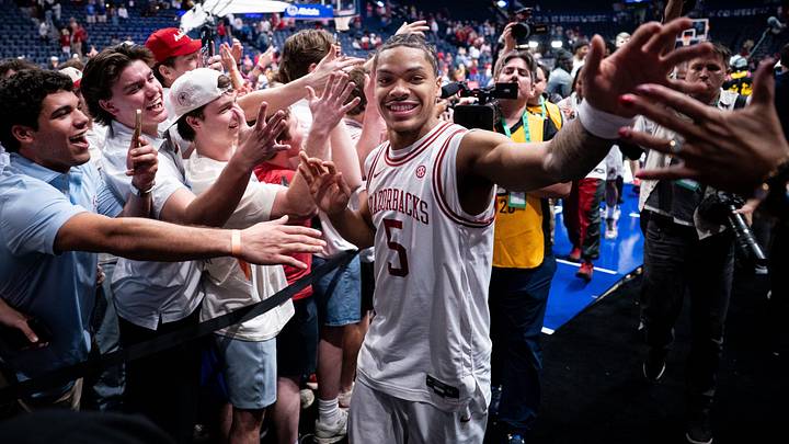 Arkansas guard Darius Acuff Jr. (5) celebrates after defeating Mississippi in overtime during a SEC tournament semifinal game at Bridgestone Arena in Nashville, Tenn., Saturday, March 14, 2026.