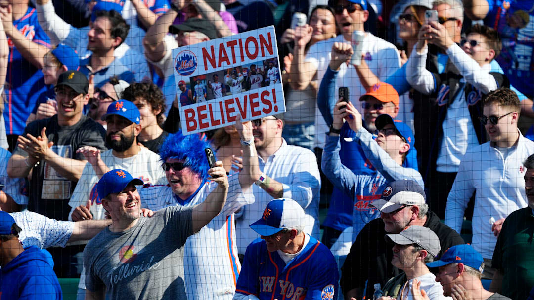 New York Mets fans celebrate on Opening Day, Thursday, March 26, 2026. Their team beat the Pittsburgh Pirates, 11-7.