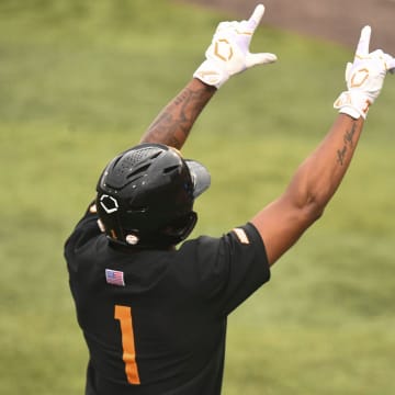 Tennessee's Christian Moore (1) celebrates after rounding the bases on a home run against Evansville during the Knoxville Regional of the NCAA baseball tournament on Sunday, June 9, 2024 in Knoxville, Tenn.