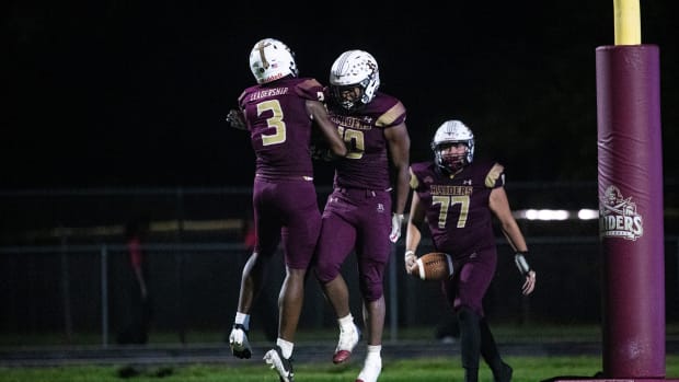 Riverdale's Lovensky Blanchard (No. 10, middle) celebrates a touchdown against South Fort Myers on Friday, Aug. 30, 2024.