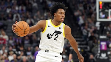 Dec 8, 2024; Sacramento, California, USA; Utah Jazz guard Collin Sexton (2) dribbles against the Sacramento Kings during the third quarter at Golden 1 Center. Mandatory Credit: Darren Yamashita-Imagn Images