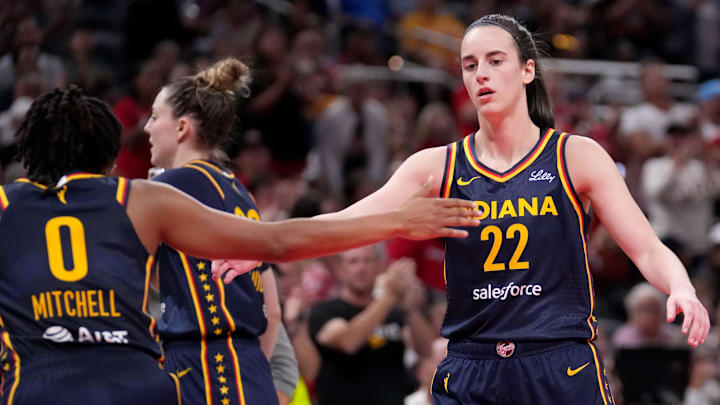 Indiana Fever guard Caitlin Clark (22) and guard Kelsey Mitchell (0) celebrate. Indiana Fever guard Caitlin Clark (22) and guard Kelsey Mitchell (0) celebrate.