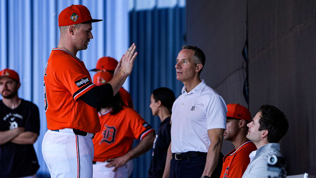 Detroit Tigers pitcher Tarik Skubal, left, talks to team owner Chris Ilitch, center, and president of baseball operations Scott Harris at practice during spring training at TigerTown in Lakeland, Fla. on Friday, Feb. 20, 2026.