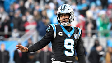 Dec 22, 2024; Charlotte, North Carolina, USA;  Carolina Panthers quarterback Bryce Young (9) on the field in overtime at Bank of America Stadium. Mandatory Credit: Bob Donnan-Imagn Images