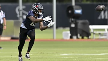 Jun 10, 2025; Houston, TX, USA; Houston Texans wide receiver Nico Collins (12) participates in a drill during an NFL football minicamp at NRG Stadium. Mandatory Credit: Maria Lysaker-Imagn Images 