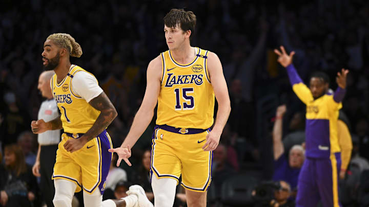 Nov 8, 2024; Los Angeles, California, USA; Los Angeles Lakers guard Austin Reaves (15) reacts after shooting a three point basket against the Philadelphia 76ers during the first half at Crypto.com Arena. Mandatory Credit: Jonathan Hui-Imagn Images