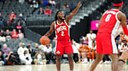 Nov 4, 2024; Las Vegas, Nevada, USA; Ohio State Buckeyes guard Bruce Thornton (2) directs a play against the Texas Longhorns during the second half at T-Mobile Arena. Mandatory Credit: Stephen R. Sylvanie-Imagn Images