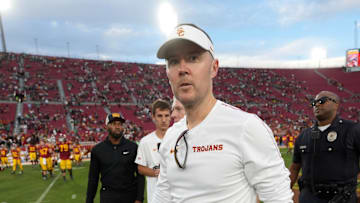 Nov 30, 2024; Los Angeles, California, USA; Southern California Trojans head coach Lincoln Riley leaves the field after the game against the Notre Dame Fighting Irish at United Airlines Field at Los Angeles Memorial Coliseum. Mandatory Credit: Kirby Lee-Imagn Images