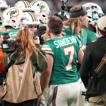 Miami Dolphins place kicker Jason Sanders (7) is congratulated by teammates after kicking the game-winning field goal against the Dallas Cowboys during an NFL game at Hard Rock Stadium in Miami Gardens, Dec. 24, 2023.