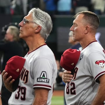 Arizona Diamondbacks manager Torey Lovullo (17) and bench coach Jeff Banister (82) look on before game two of the 2023 World Series against the Texas Rangers at Globe Life Field on Oct. 28, 2023, Arlington, Texas.