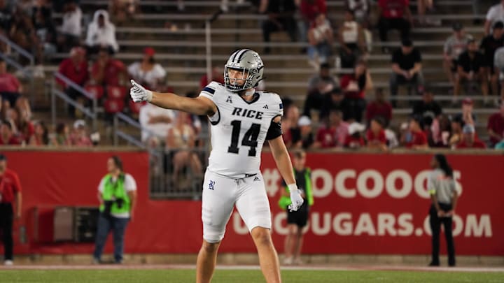Sep 14, 2024; Houston, Texas, USA; Rice Owls tight end Boden Groen (14) checks with the sideline in the second quarter at TDECU Stadium. Mandatory Credit: Sean Thomas-Imagn Images