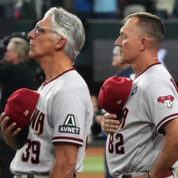 Arizona Diamondbacks manager Torey Lovullo (17) and bench coach Jeff Banister (82) look on before game two of the 2023 World Series against the Texas Rangers at Globe Life Field on Oct. 28, 2023, Arlington, Texas.