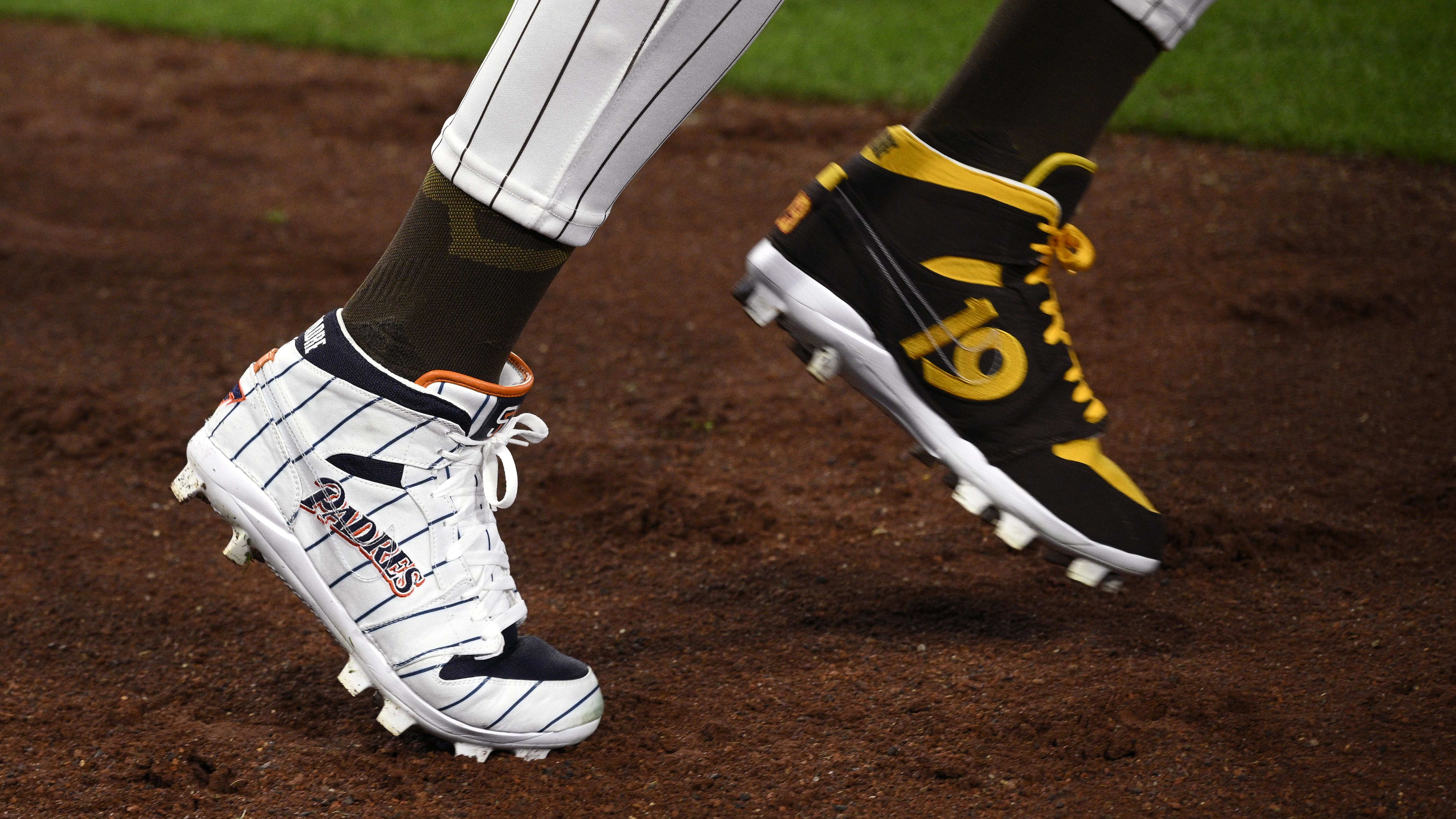 San Diego Padres outfielder Fernando Tatis Jr.'s white and brown cleats.