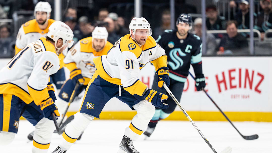 Mar 10, 2026; Seattle, Washington, USA; Nashville Predatorsforward Steven Stamkos (91) skates with the puck during the third period against the Seattle Kraken at Climate Pledge Arena. Mandatory Credit: Stephen Brashear-Imagn Images