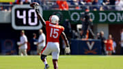 Oct 5, 2024; Charlottesville, Virginia, USA; Virginia Cavaliers defensive end Chico Bennett Jr. (15) celebrates after an interception during the fourth quarter against the Boston College Eagles at Scott Stadium. Mandatory Credit: Peter Casey-Imagn Images
