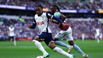 Destiny Udogie being closed down by the other full-back in the team of the week