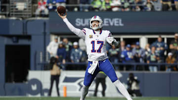 Oct 27, 2024; Seattle, Washington, USA; Buffalo Bills quarterback Josh Allen (17) passes against the Seattle Seahawks during the first quarter at Lumen Field. Mandatory Credit: Joe Nicholson-Imagn Images