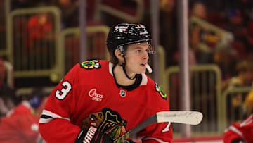 Apr 6, 2025; Chicago, Illinois, USA; Chicago Blackhawks left wing Lukas Reichel (73) warms up before the second period against the Pittsburgh Penguins at United Center. Mandatory Credit: Talia Sprague-Imagn Images