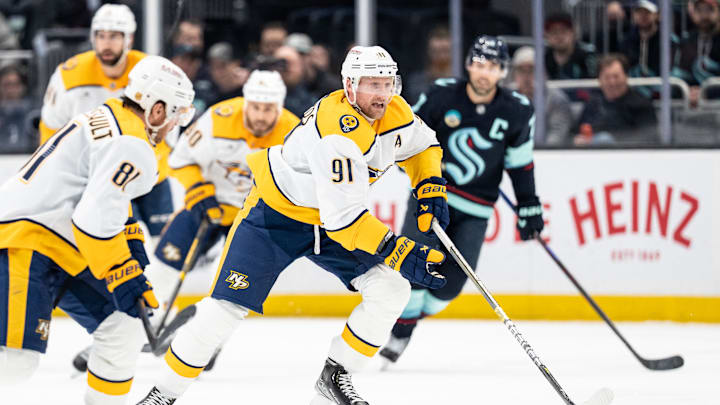 Mar 10, 2026; Seattle, Washington, USA; Nashville Predatorsforward Steven Stamkos (91) skates with the puck during the third period against the Seattle Kraken at Climate Pledge Arena. Mandatory Credit: Stephen Brashear-Imagn Images